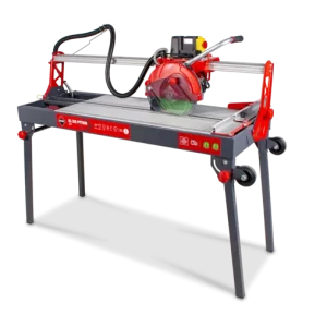 Cut-out image of large tile cutter machine with red saw and long grey table on legs on transparent background